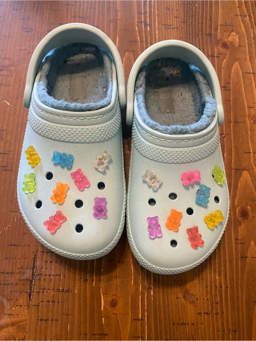 CROCS Kids Light Blue Fuzzy Lined Clogs with Colorful Gummy Charms